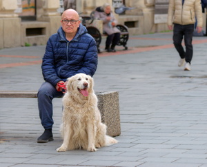 Man with white dog